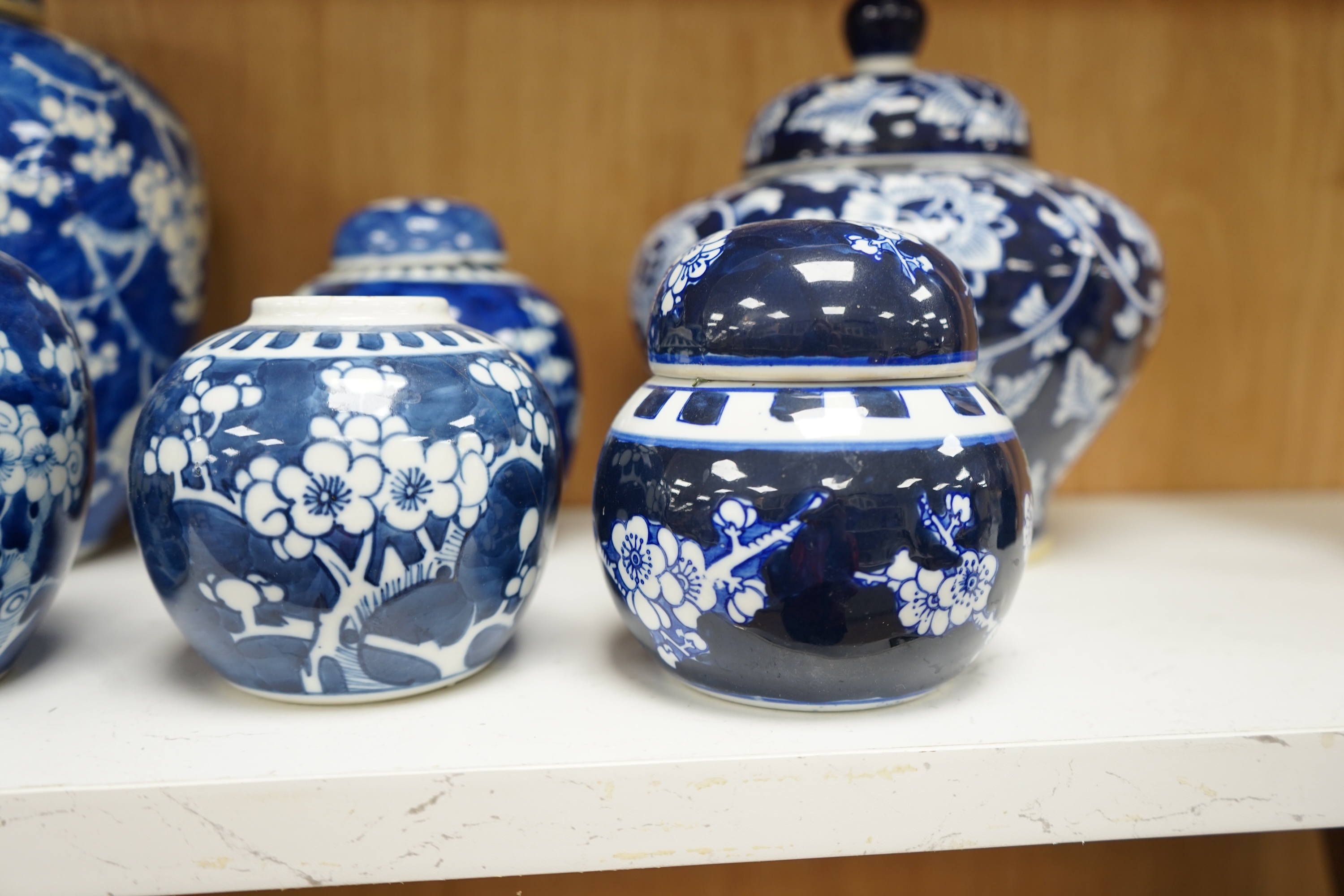 Six various Chinese prunus pattern blue and white jars, tallest 26cm. Condition - varies